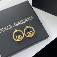 BRINCO DOLCE & GABBANA DOURADO LOGOTIPO 